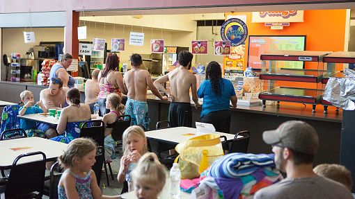 Water-Zoo Clinton Food Court Guests lining up to buy food at Water-Zoo Indoor Water Park Clinton
