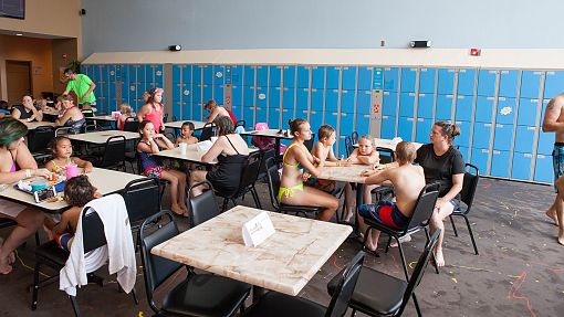 Lockers at Water-Zoo Clinton People snacking at tables in front of lockers at the Water-Zoo