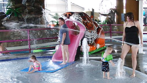 Water-Zoo-Clinton Cub's Cove Little kids with parents enjoying the splash pool at the Water-ZooWater-Zoo Indoor water park in Clinton, Oklahoma