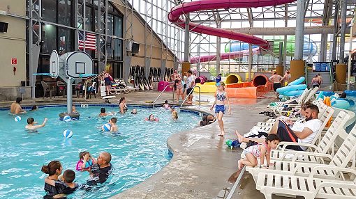 Guests in and around Activity Pool at Water-Zoo Indoor Water Park in Clinton, Oklahoma Guests in and around Activity Pool at Water-Zoo Indoor Water Park in Clinton, Oklahoma