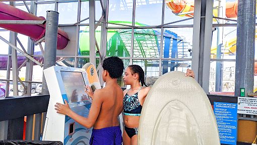 Kids registering for Slideboarding at Water-Zoo Indoor Water Park in Clinton, Oklahoma Kids registering for Slideboarding at Water-Zoo Indoor Water Park in Clinton, Oklahoma